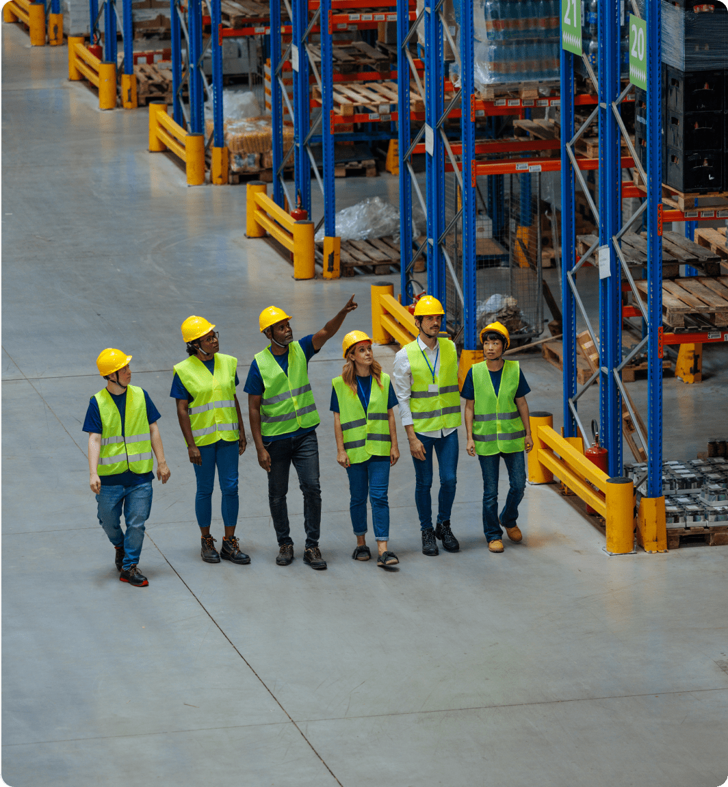 Team of workers in a large warehouse