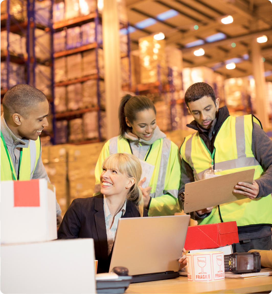Warehouse team discussing logistics