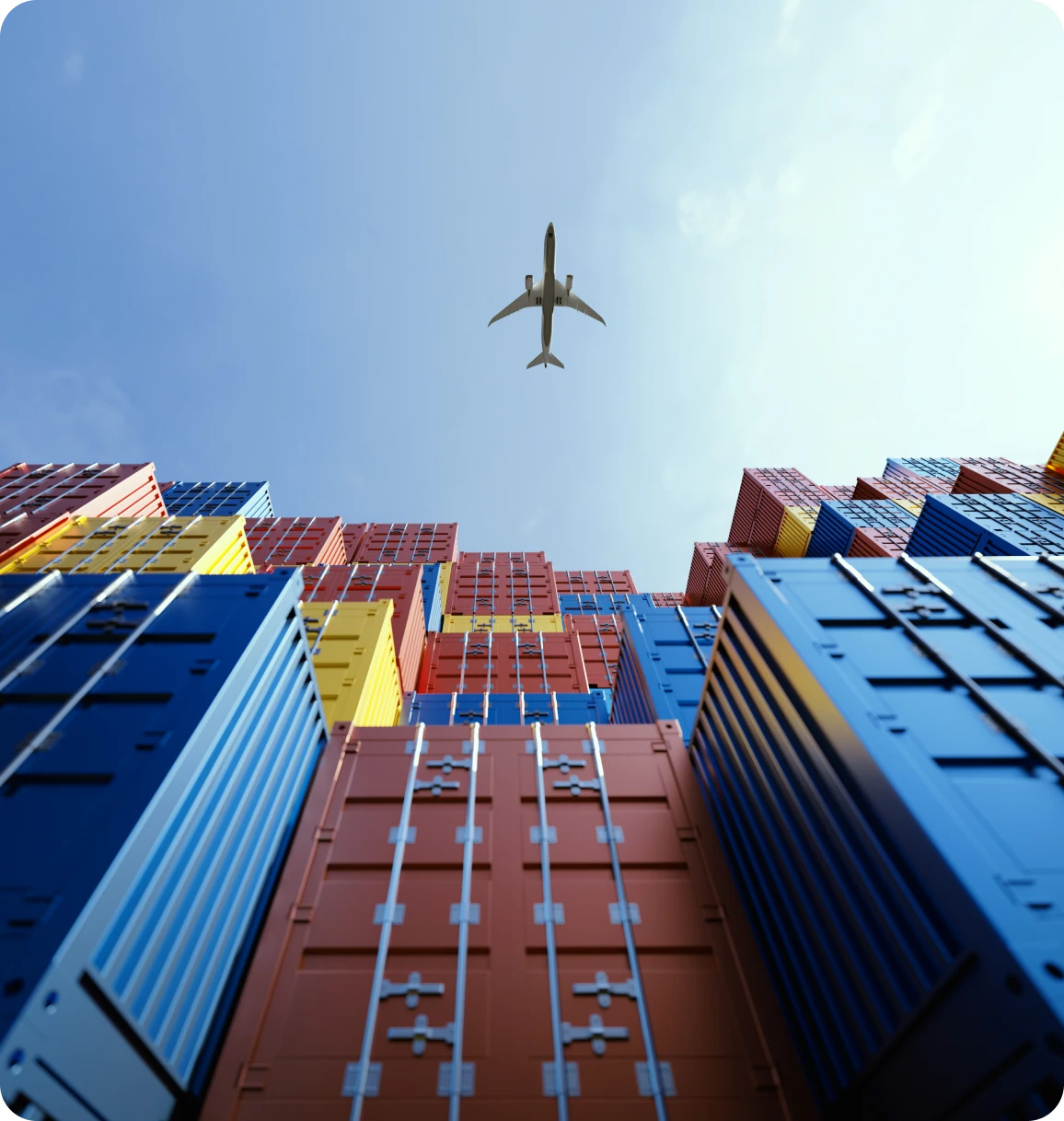 Aircraft soaring above container stacks
